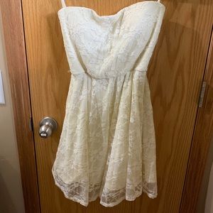 white sleeveless dress with lace